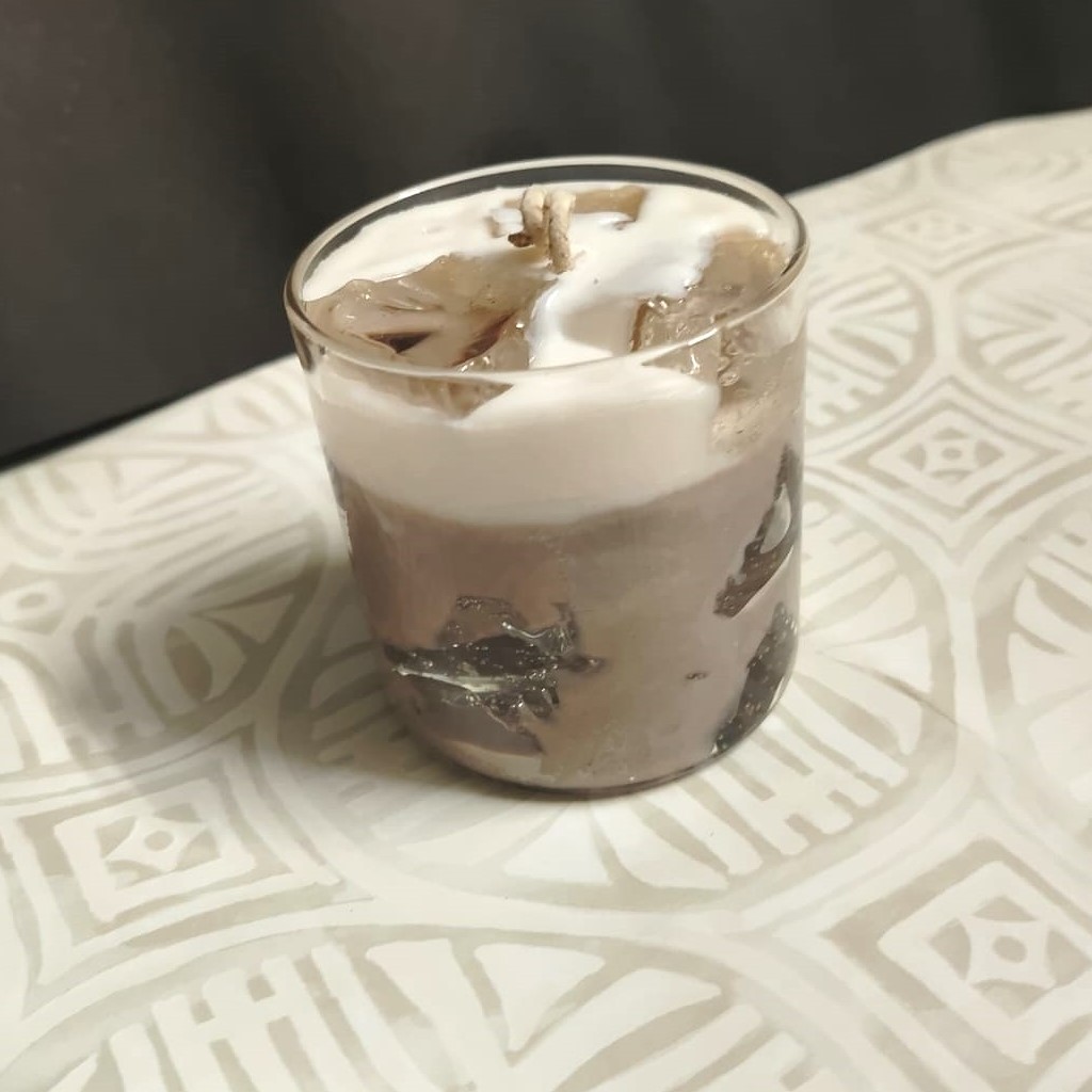 WhatsApp Image 2025-06-14 at 5.37.09 PM (1) A dessert-themed iced mocha swirl soy candle with whipped topping in a transparent glass jar.