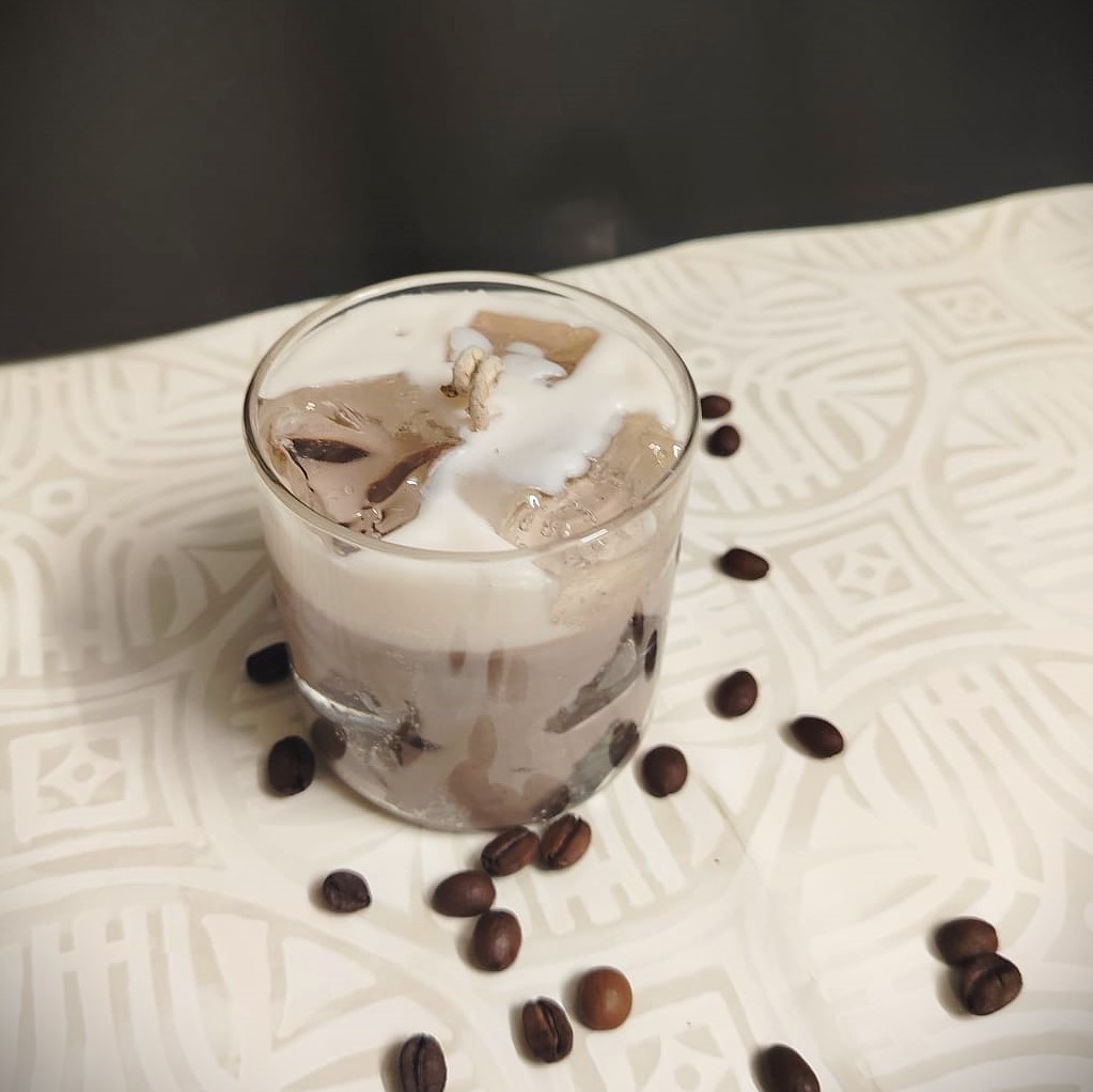 WhatsApp Image 2025-06-14 at 5.37.09 PM (9) A dessert-themed iced mocha swirl soy candle with whipped topping in a transparent glass jar.